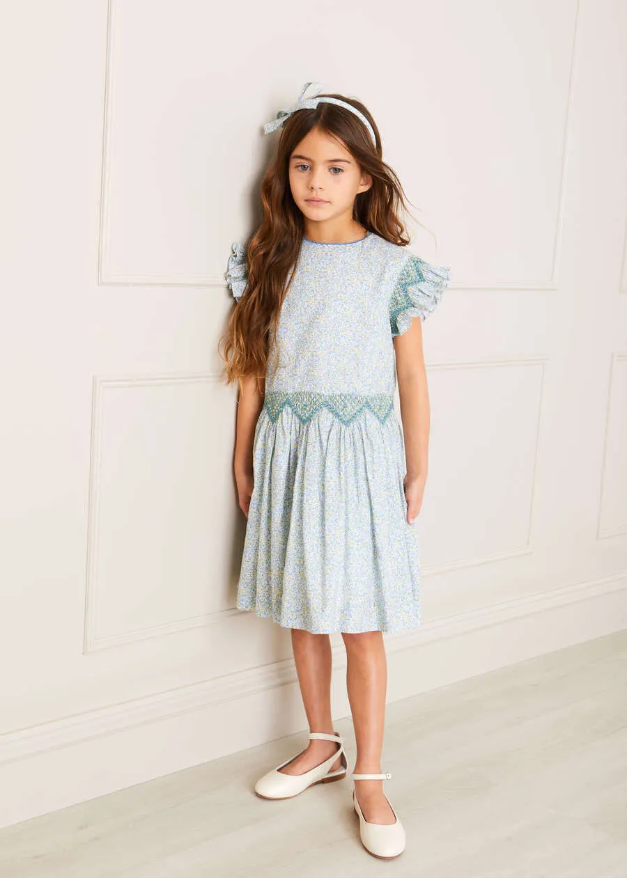 Matilda Floral Print Handsmocked Sleeveless Dress in Blue (4-10yrs)