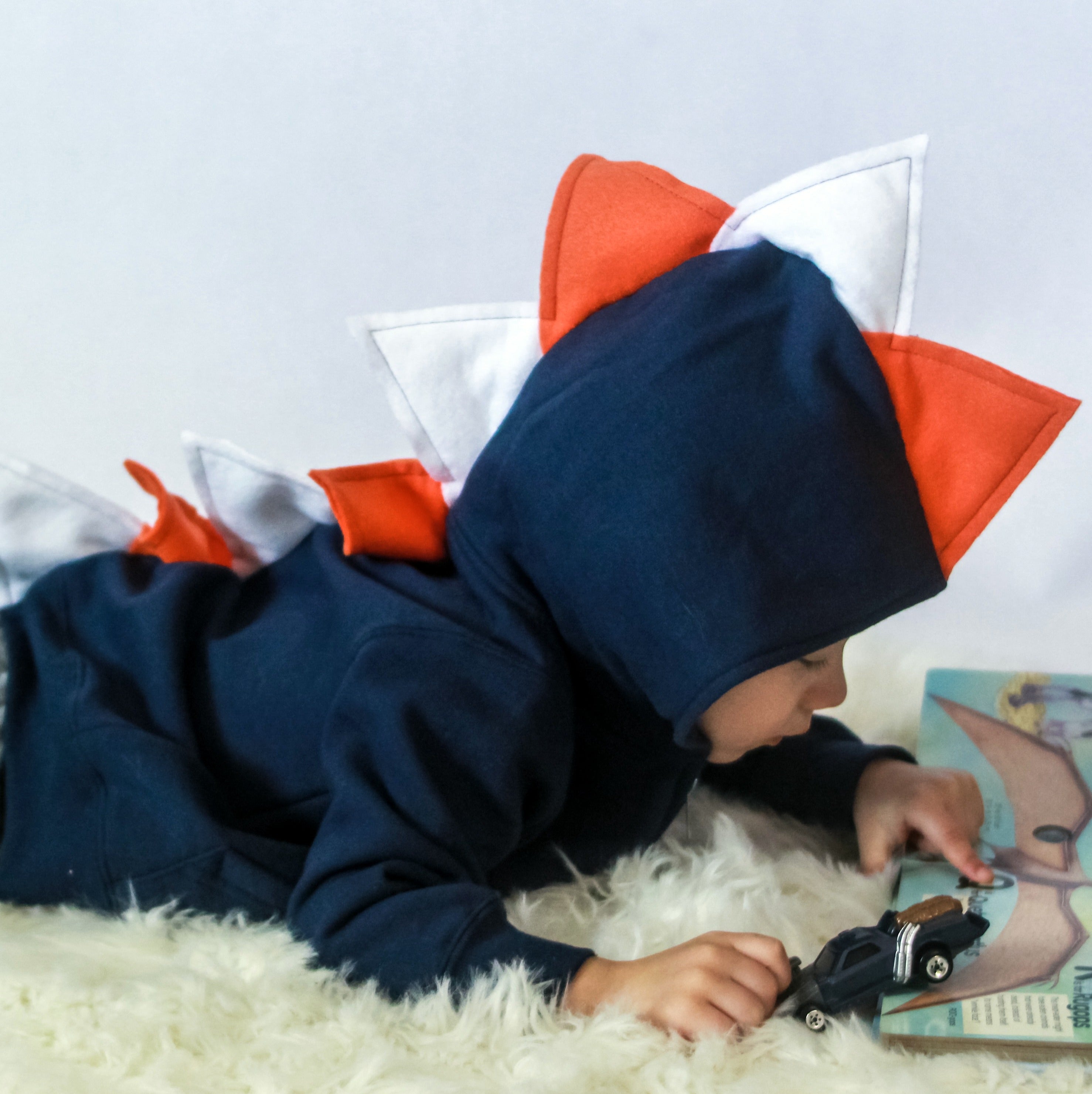 Navy Blue Dino Hoodie with Orange + White Spikes