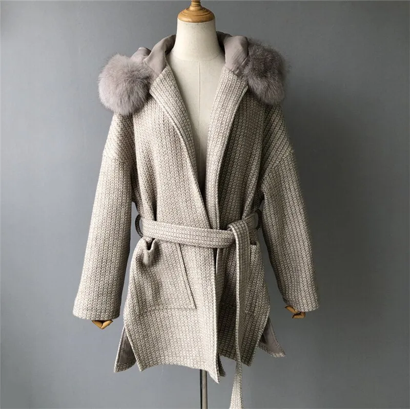 Woolen coat with a hood in real fur with a collar and long sleeves