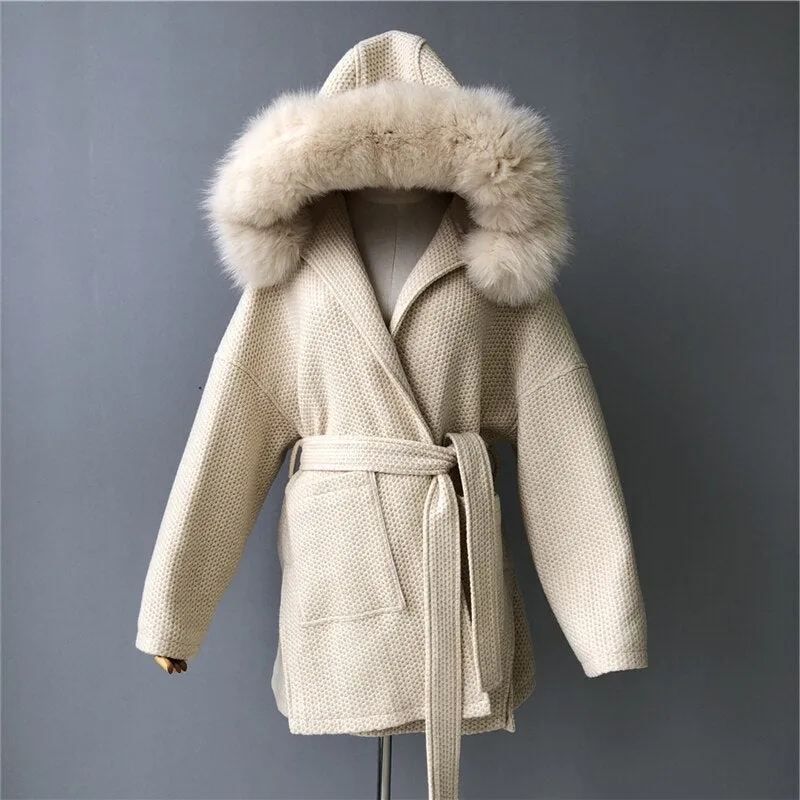 Woolen coat with a hood in real fur with a collar and long sleeves