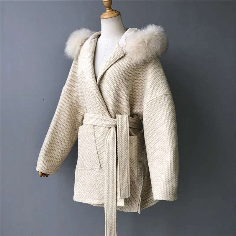 Woolen coat with a hood in real fur with a collar and long sleeves